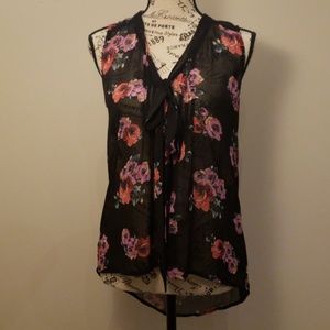 Black floral sheer sleeveless blouse.